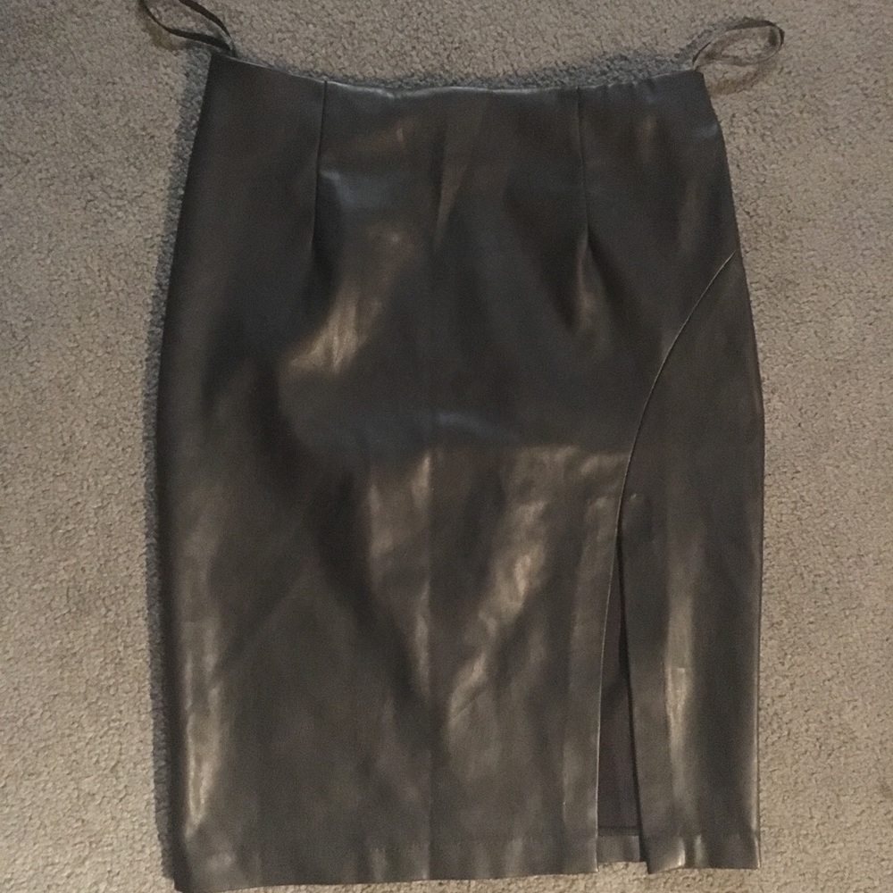 Black pleather skirt with cut out.